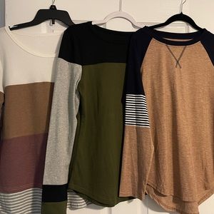 Long sleeve shirts, different patterns. Size medium